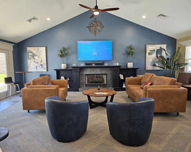 Modern clubhouse available for resident events—stylish, comfortable, and perfect for gatherings. - Compass Pointe Apartments
