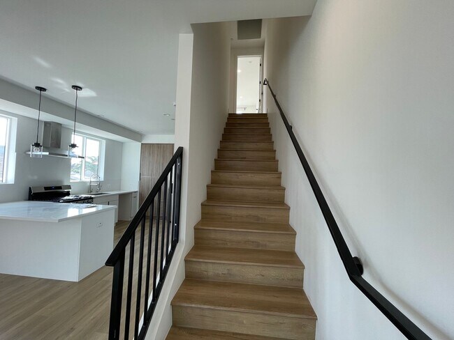 Building Photo - JUST COMPLETED MODERN TOWNHOMES! Never Liv...