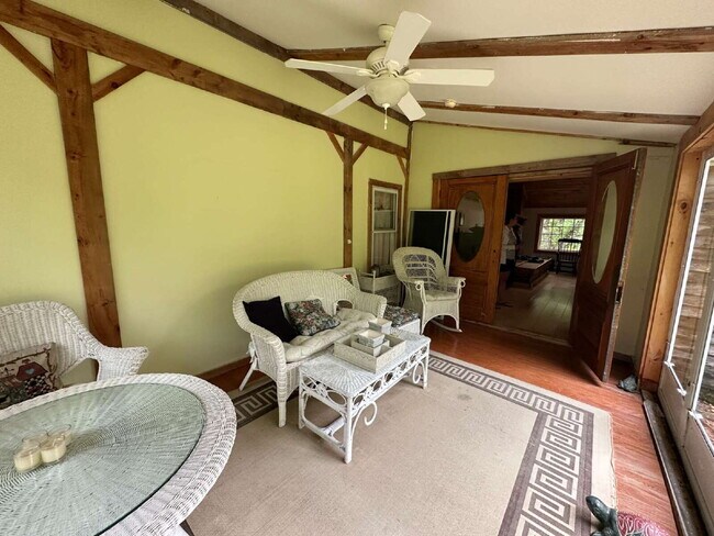 Building Photo - Charming 3BR Waterfront Retreat with Sunroom, Brick Accent & Scenic Lake Views