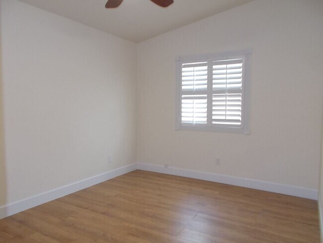 Building Photo - Charming Home in Gated Melrose Park Estates with Dual Fireplaces & Covered Patio
