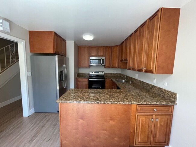 Building Photo - 2 bedroom, 2.5 bath 2 story condo now avai...