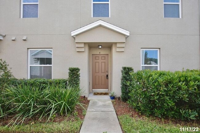 Building Photo - Spacious 3/2.5 Townhome with a 2 Car Garage and a Beautiful Pond View in Westwood Condos - Orlando!