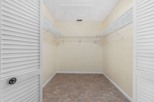 Building Photo - 2BR 2BA Villa Available Now On Top of the Word!