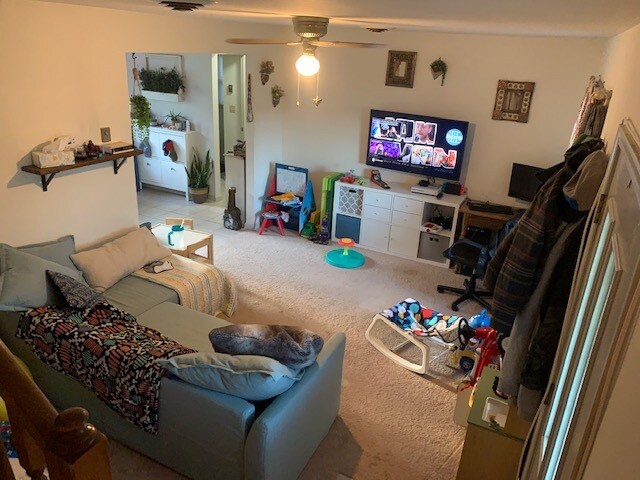 Living room as seen from the bottom of the steps - 917 Rose Hill Ave