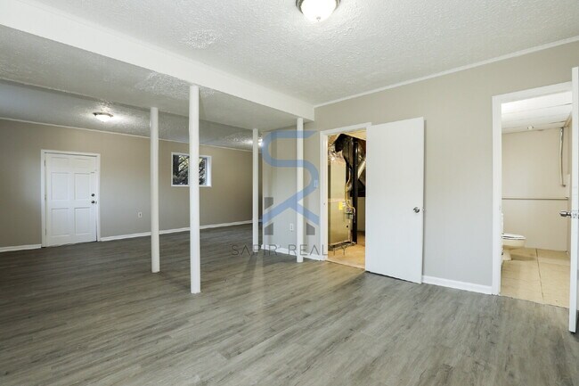 Building Photo - Move in before February 28th and choose your reward: a $250 Amazon Gift Card or a 55" Smart TV!