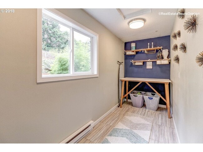 Building Photo - Spacious 4-Bedroom Home with Multiple Livi...