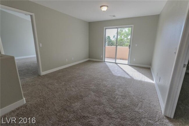 Building Photo - 9029 Blue Raven Ave