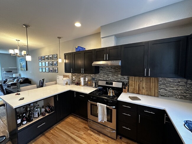 Building Photo - "Experience Modern Comfort: Spacious 2-Bed...