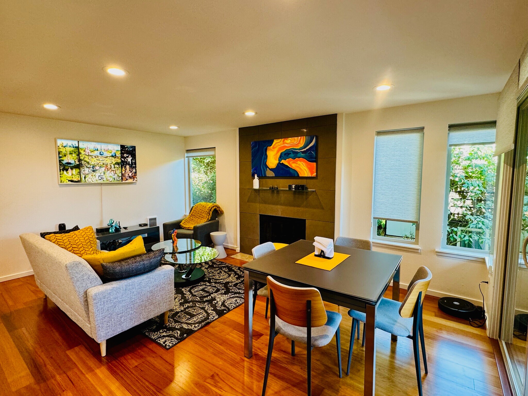 Living room with wood fireplace ideal for entertaining or relaxing in comfort. - 2145 Dexter Ave N
