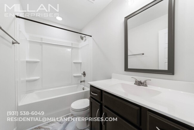 Building Photo - Spacious And Updated Home Featuring Open F...