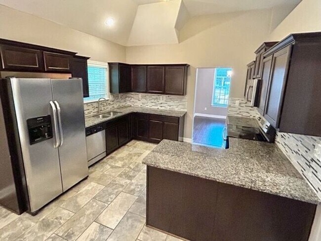 Building Photo - Now Leasing A 4 Bedroom 2 Bath Home In Oli...