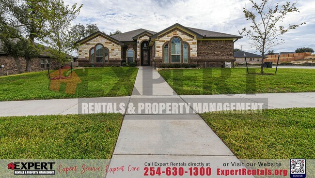 Building Photo - Elegant Corner-Lot Retreat with Upgraded F...