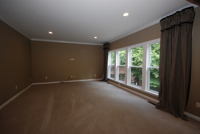 Building Photo - Oversized Executive Style Home with Finish...