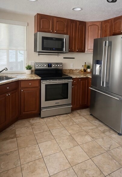 Building Photo - 17336 E Kenyon Dr