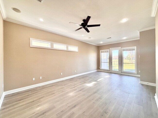 Building Photo - Stunning 5-Bedroom Home with Breathtaking Lake & Golf Course Views – Pelican Point Subdivision