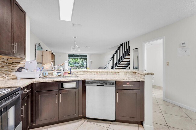 Building Photo - 7690 Lago Del Mar Dr