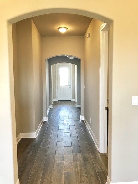Wood like tile throughout - 3750 E Palm Valley Blvd