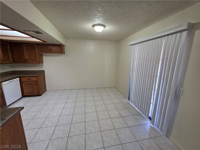 Building Photo - 6671 W Tropicana Ave