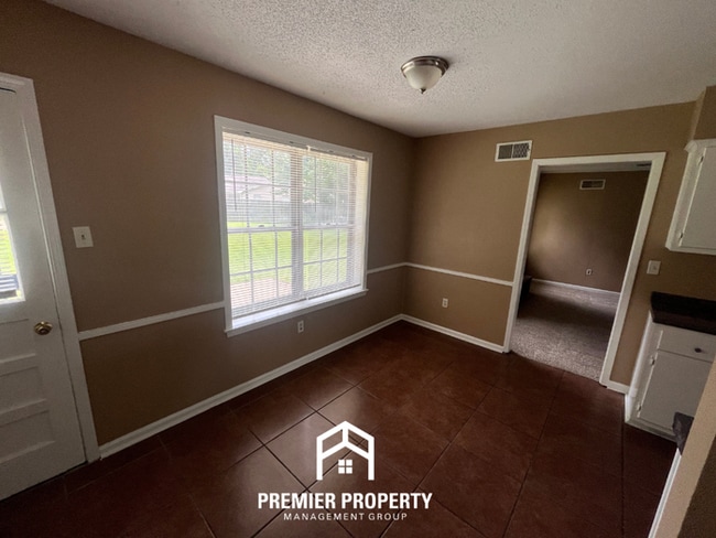 Building Photo - Spacious 4BR/2BA Whitehaven Home | 1,701 Sq Ft, Brick Fireplace & Quiet Cove