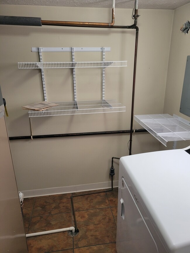 Plenty of storage in laundry room - 1172 Worthington Woods Blvd