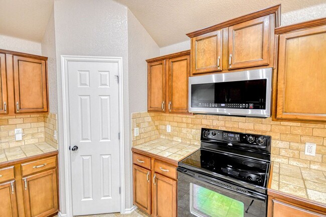 Building Photo - Beautiful three bedroom home with in-ground storm shelter!