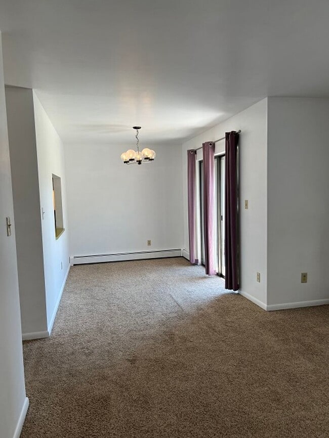 Building Photo - Well-Appointed Apartment Available This August
