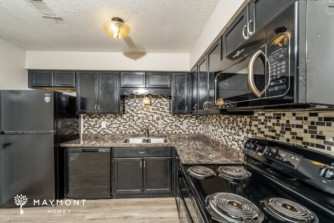 Building Photo - Charming 3-Bedroom, 2-Bath Brick Home in P...