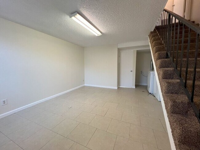 Building Photo - Three Bedroom Two and half Bathroom Tri...