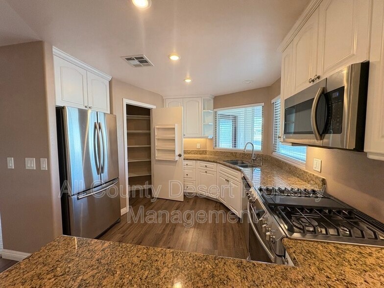 Building Photo - 38251 Desert Greens Dr E