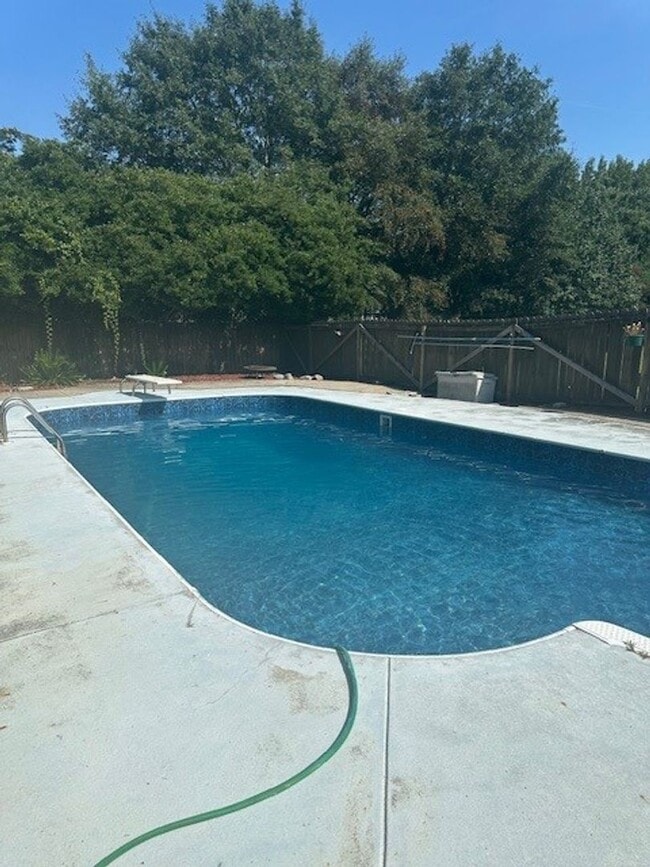 Building Photo - Spacious Home with Bonus Room, Pool & Solar Panels in Goldsboro!