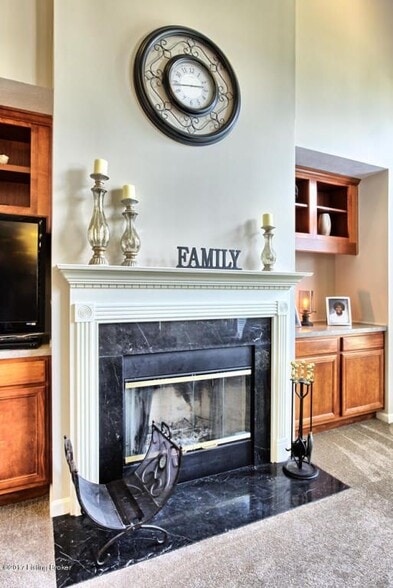 Family Room with cozy fireplace - 9217 Eminence Ct