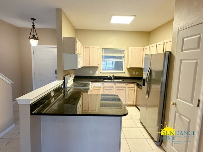 Building Photo - 3 Bedroom Townhome with Community Pools, Dock & Beach Access in Hidden Bay Village!