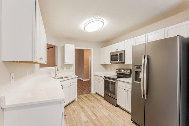 Building Photo - Spacious 4-Bedroom on a Corner Lot