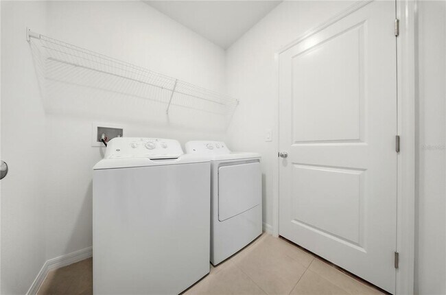 Building Photo - 5739 Purple Finch Ave