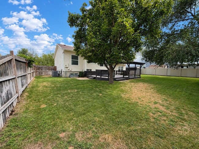 Building Photo - Spacious 5-Bedroom Sandy Home with Large Fenced Yard