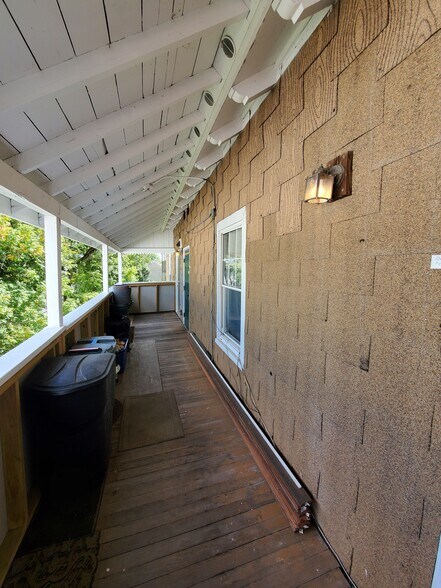 Rear covered porch, looks over back yard. - 3 Ludlow St