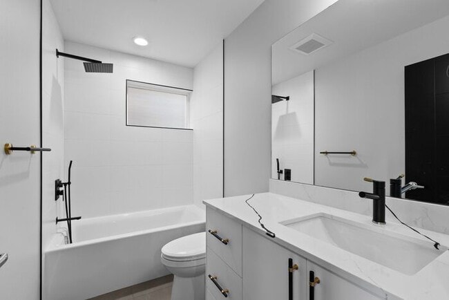 Building Photo - Newly Built Air-Conditioned Luxury Townhome in Highly Desired Admiral