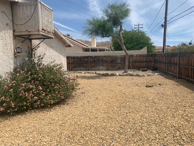 Building Photo - "Charming 3-Bed Oasis in Desert Hot Springs with Granite Touch & Cozy Fireplace!"