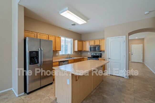 Building Photo - 44299 W Oster Dr