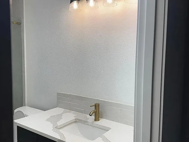 Building Photo - This newly remodeled home
