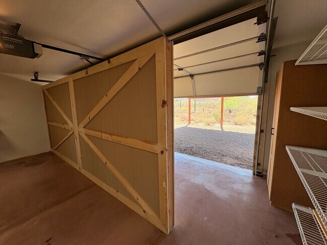Building Photo - Desert Home on 3.3 Acres with Rooftop Views & Unique Rammed Earth Design