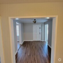 Building Photo - Roomy Cute Brick Ranch
