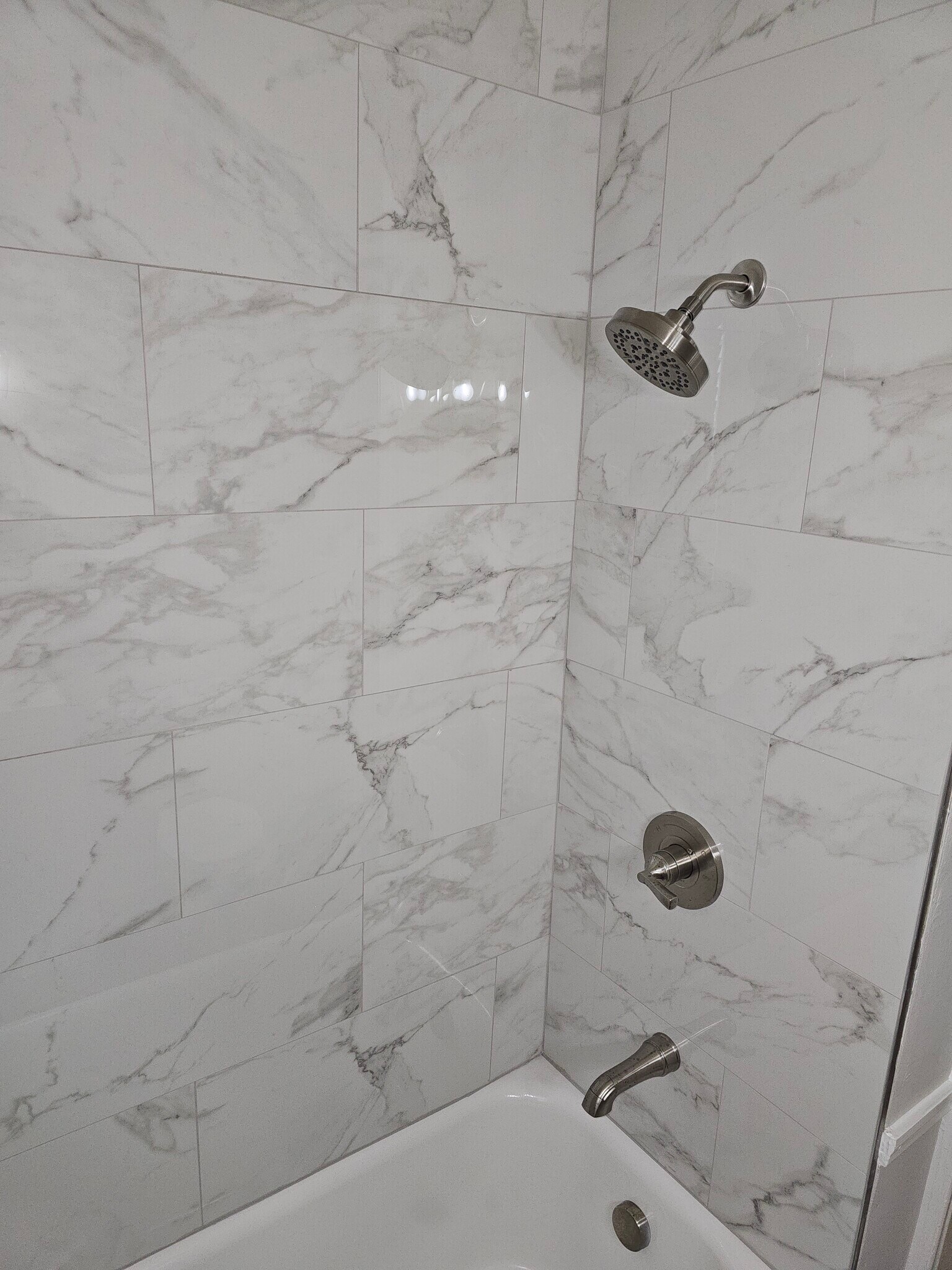 marble shower - 131 E Park Ave