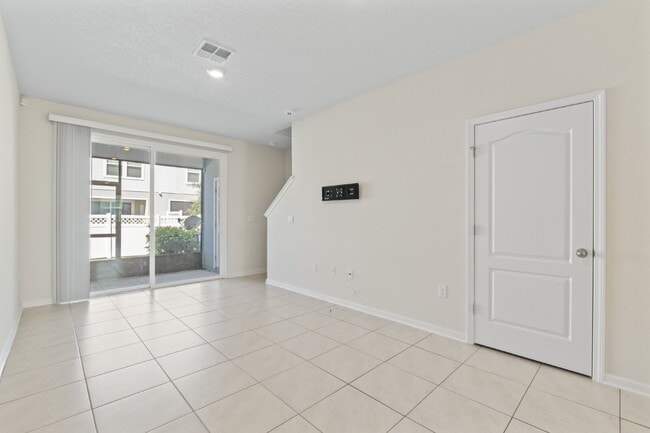 Building Photo - Oakleaf Plantation 3-Bedroom Townhouse in Towering Oaks – Spacious 1450 Sq Ft Living with 2 Full ...