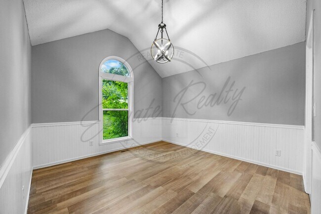Building Photo - Four Bedroom Two Story with Two Car Garage...