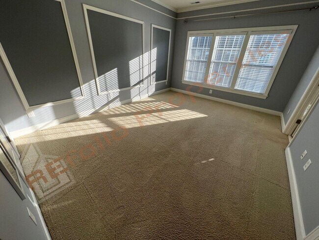 Building Photo - Elegant 3 Story 3 Bedroom Formal Model Tow...