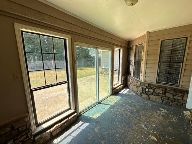 Building Photo - Grand 4BR/2BA Near Southwind | 2,438 Sq Ft, Stone Fireplace, Soaking Tub & 2-Car Garage