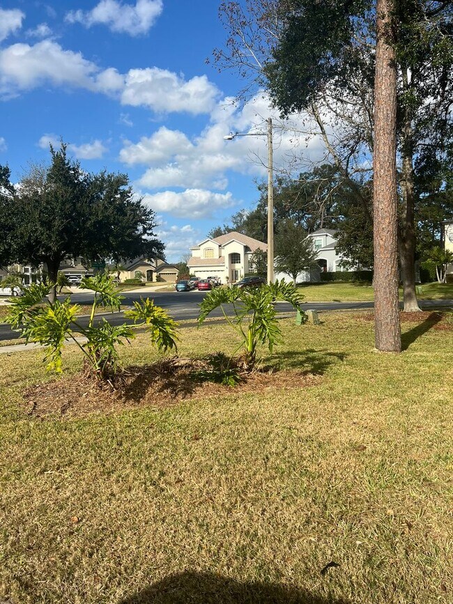 Building Photo - Water view 4/2 home in gated Spring Glen Community-Move-In Ready- 2 Car Garage- Debary!