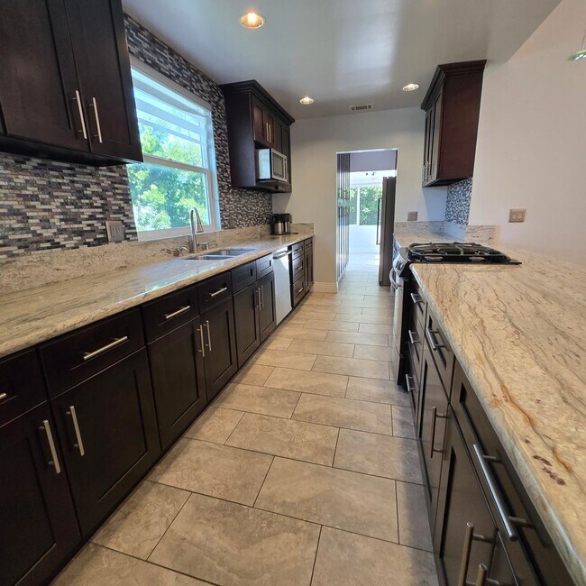 Building Photo - “Spacious West LA 3-Bedroom Home with Private Backyard & Modern Upgrades