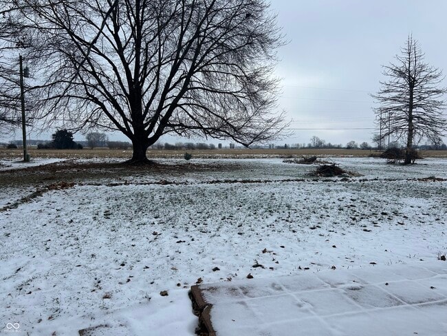 Building Photo - 8667 N Ricks Dr E